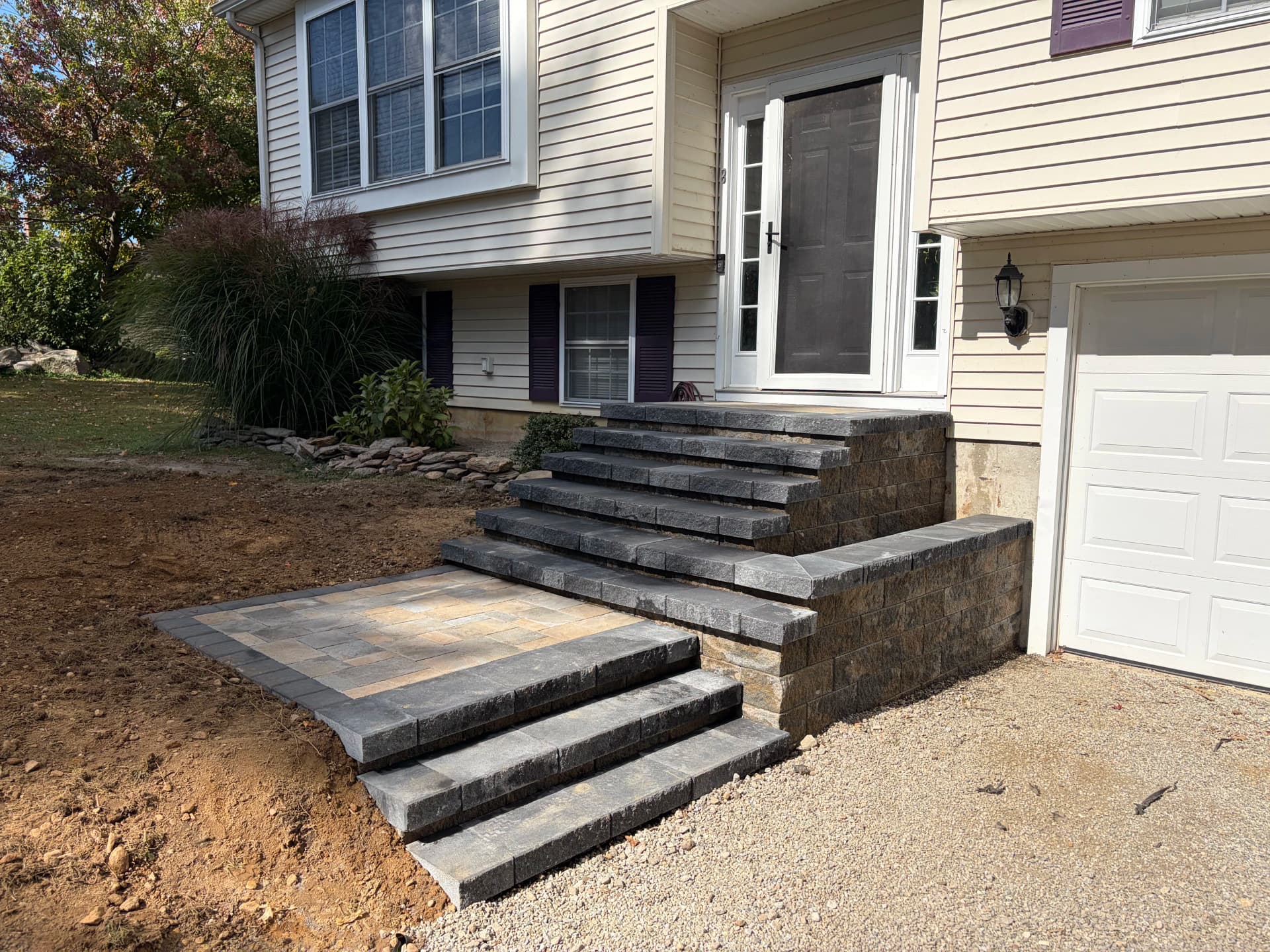 Front Entry Staircase Replaced With Pavers and a Solid Landing image